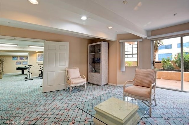 sitting room featuring recessed lighting, carpet flooring, beamed ceiling, and baseboards
