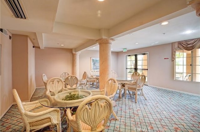 carpeted dining area with visible vents, decorative columns, recessed lighting, and baseboards