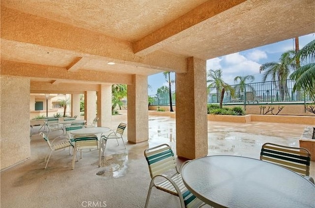 view of patio / terrace with fence and outdoor dining area
