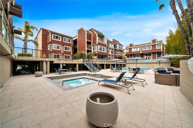4300 Via Dolce Unit 316, Marina Del Rey, CA 90292 - community pool featuring a patio area, outdoor lounge area, and a community hot tub