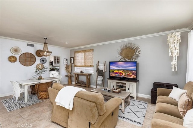 living room featuring baseboards, visible vents, ornamental molding, and light tile patterned floors