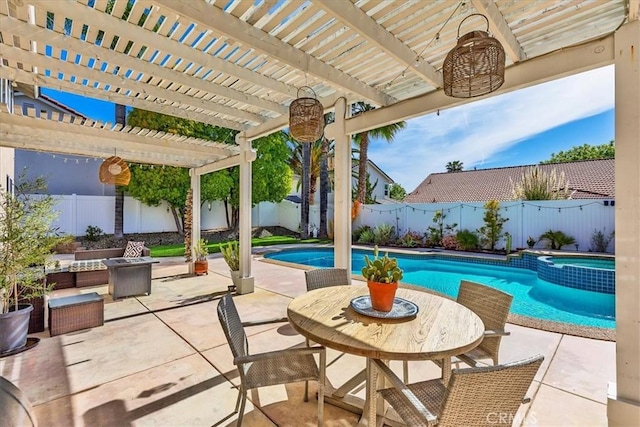 view of patio / terrace featuring a pergola, a pool with connected hot tub, and a fenced backyard