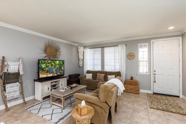 living area with baseboards, ornamental molding, and light tile patterned flooring