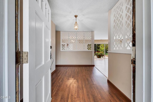 1530 Calle Portada, Camarillo, CA 93010 - hallway with wood finished floors, a textured ceiling, and baseboards