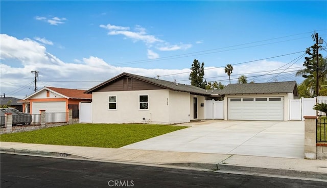 ranch-style house featuring a front lawn, concrete driveway, fence, an attached garage, and stucco siding