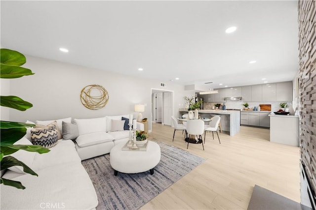 12 Whitewood Way, Irvine, CA 92612 - living area with recessed lighting, light wood-style flooring, and visible vents