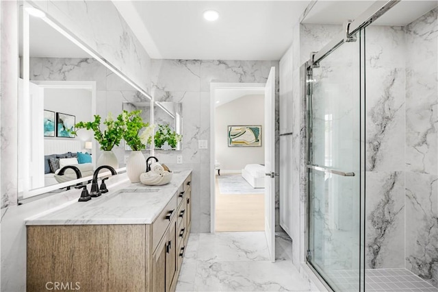 12 Whitewood Way, Irvine, CA 92612 - ensuite bathroom with double vanity, connected bathroom, a sink, marble finish floor, and a marble finish shower