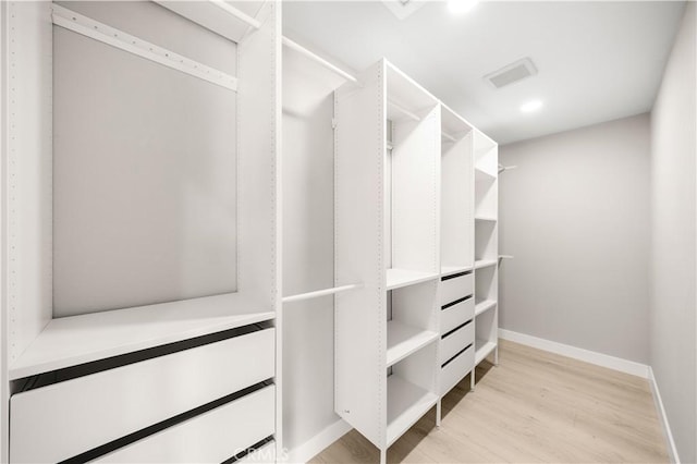 12 Whitewood Way, Irvine, CA 92612 - walk in closet featuring light wood-type flooring and visible vents