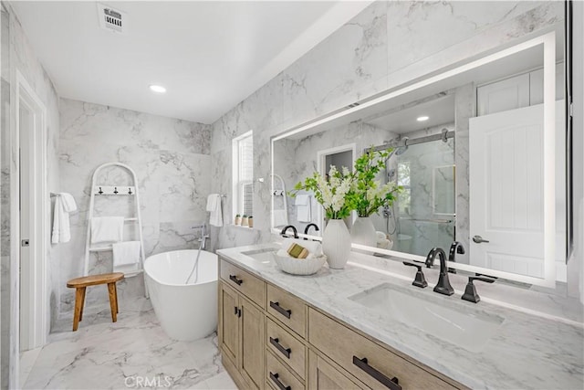 12 Whitewood Way, Irvine, CA 92612 - full bathroom with double vanity, a freestanding tub, a sink, marble finish floor, and a marble finish shower