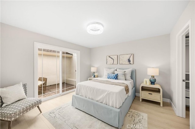 12 Whitewood Way, Irvine, CA 92612 - bedroom with baseboards and light wood finished floors
