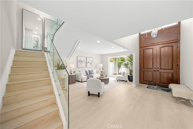 12 Whitewood Way, Irvine, CA 92612 - living room featuring recessed lighting, stairs, and light wood-style flooring