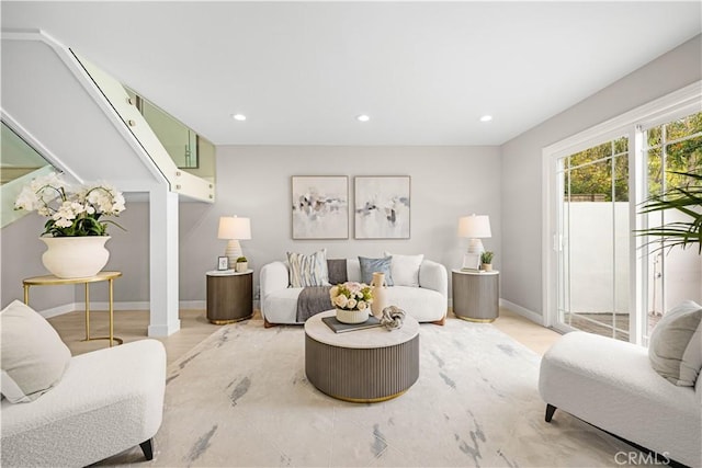 12 Whitewood Way, Irvine, CA 92612 - living room with baseboards, recessed lighting, light wood-style flooring, and stairs
