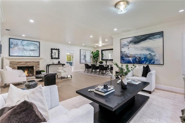 28 W Sycamore Ave, Arcadia, CA 91006 - living room featuring ornamental molding, baseboards, recessed lighting, a fireplace, and light wood-style floors