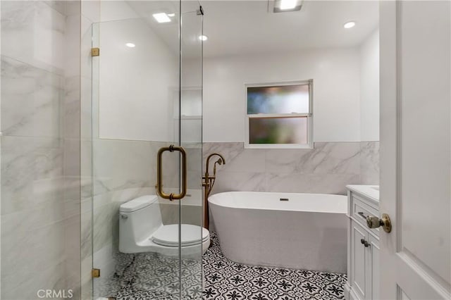 28 W Sycamore Ave, Arcadia, CA 91006 - full bath with tile walls, a freestanding bath, toilet, a stall shower, and vanity