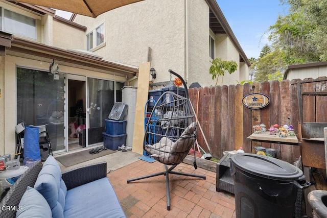 view of patio / terrace with fence