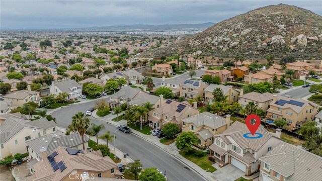 3882 Strand Way, Perris, CA 92571 - aerial view of residential area featuring a mountain backdrop