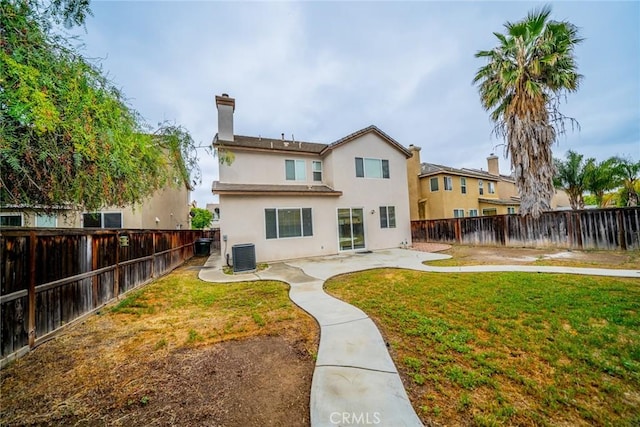 3882 Strand Way, Perris, CA 92571 - back of property featuring central AC, stucco siding, and a patio