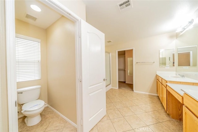 3882 Strand Way, Perris, CA 92571 - full bathroom featuring tile patterned flooring, vanity, baseboards, and toilet