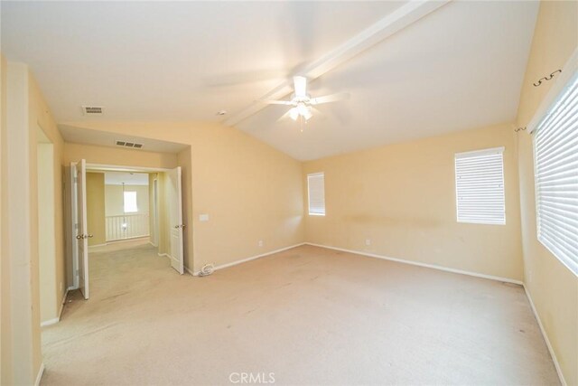 3882 Strand Way, Perris, CA 92571 - spare room featuring vaulted ceiling, ceiling fan, light carpet, and baseboards