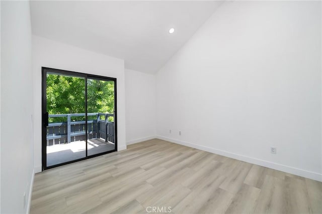 7314 Quill Dr Unit 155, Downey, CA 90242 - empty room with baseboards, lofted ceiling, wood finished floors, and recessed lighting