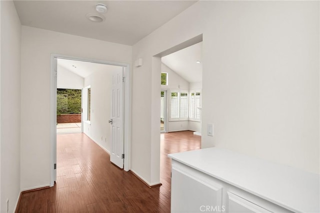 2122 Via Aguila, San Clemente, CA 92673 - hallway featuring dark wood-type flooring, baseboards, and lofted ceiling