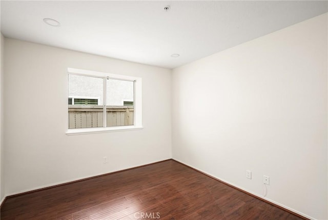 2122 Via Aguila, San Clemente, CA 92673 - empty room featuring wood finished floors, a pendent fire sprinkler, and baseboards