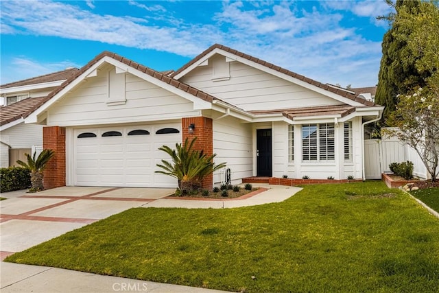 2122 Via Aguila, San Clemente, CA 92673 - view of front of house featuring a garage, a front lawn, fence, a tiled roof, and concrete driveway