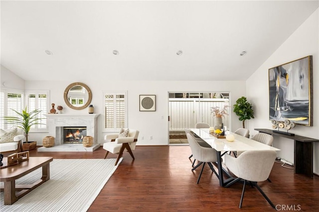 2122 Via Aguila, San Clemente, CA 92673 - dining room with lofted ceiling, wood finished floors, and a high end fireplace