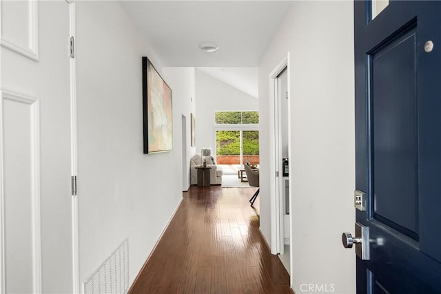 2122 Via Aguila, San Clemente, CA 92673 - hall with dark wood finished floors, vaulted ceiling, and baseboards