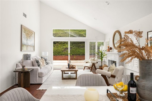 2122 Via Aguila, San Clemente, CA 92673 - living area featuring high vaulted ceiling, wood finished floors, and healthy amount of natural light