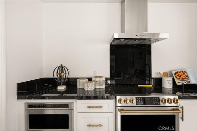 2122 Via Aguila, San Clemente, CA 92673 - kitchen with wall chimney exhaust hood, appliances with stainless steel finishes, white cabinetry, and dark countertops