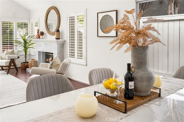 2122 Via Aguila, San Clemente, CA 92673 - living area with a premium fireplace, lofted ceiling, and wood finished floors