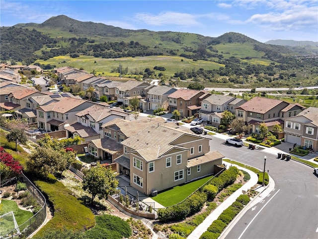 bird's eye view featuring a mountain view and a residential view