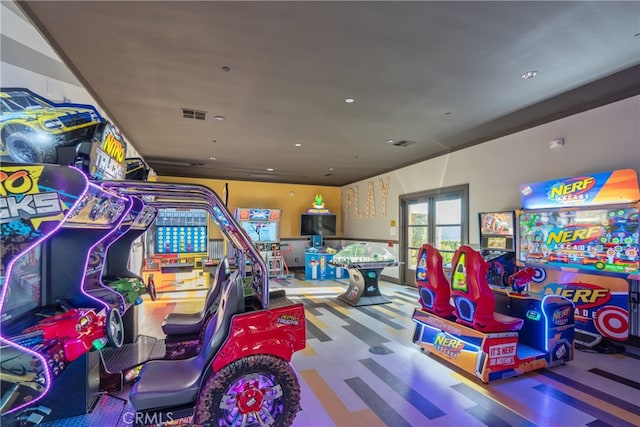 recreation room featuring visible vents and recessed lighting