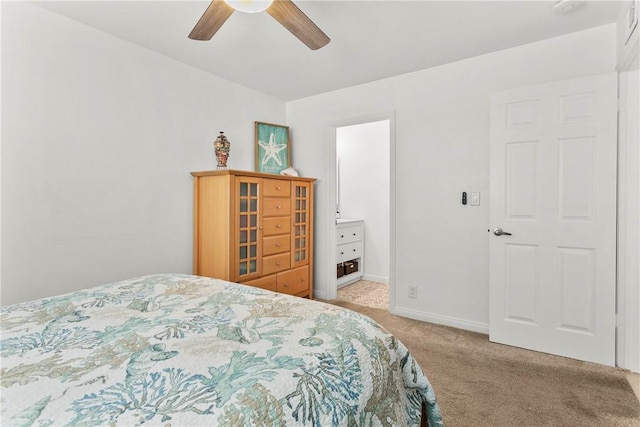 bedroom with baseboards, a ceiling fan, and light colored carpet