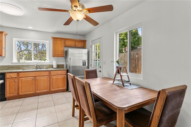 dining room featuring light tile patterned floors, a ceiling fan, recessed lighting, and a wealth of natural light