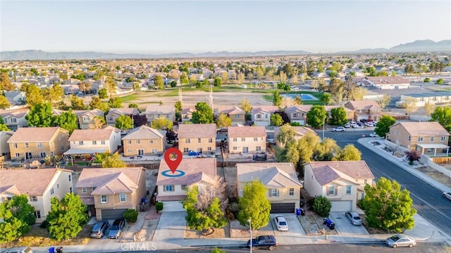 14051 Mare Ln, Victorville, CA 92394 - aerial view of residential area with a mountainous background