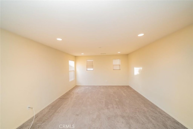 14051 Mare Ln, Victorville, CA 92394 - empty room featuring light colored carpet and recessed lighting