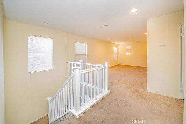 14051 Mare Ln, Victorville, CA 92394 - hallway featuring an upstairs landing, light carpet, and recessed lighting