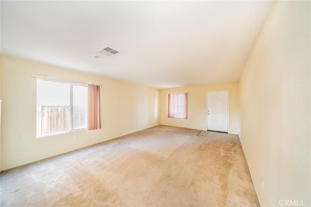 14051 Mare Ln, Victorville, CA 92394 - spare room with light colored carpet