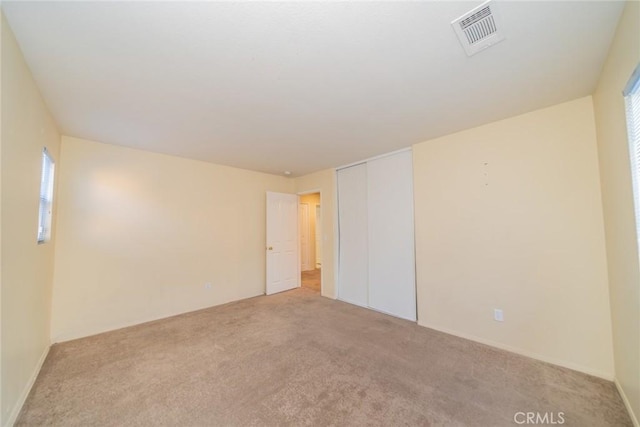 14051 Mare Ln, Victorville, CA 92394 - unfurnished room with light carpet