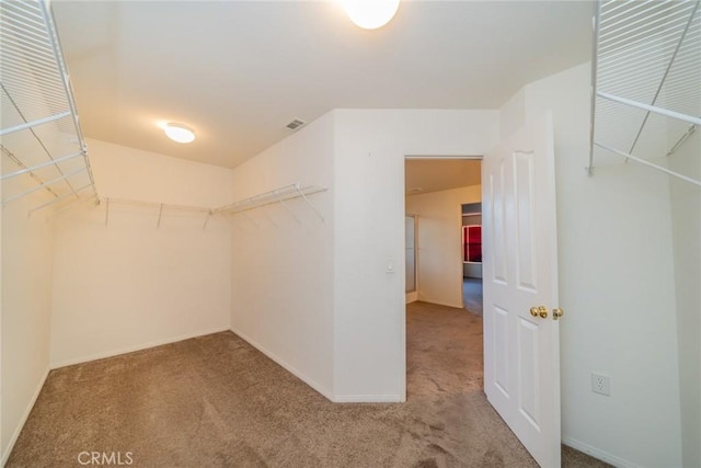 14051 Mare Ln, Victorville, CA 92394 - walk in closet featuring carpet