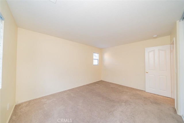 14051 Mare Ln, Victorville, CA 92394 - empty room with light carpet