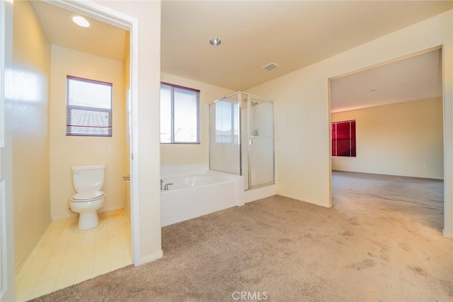 14051 Mare Ln, Victorville, CA 92394 - bathroom with a bath, a stall shower, and carpet flooring