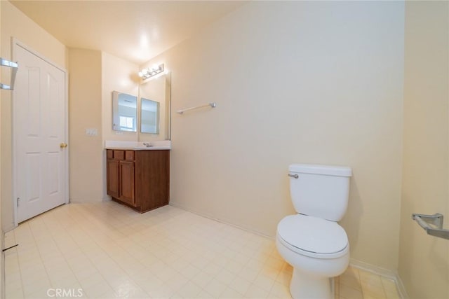 14051 Mare Ln, Victorville, CA 92394 - bathroom featuring toilet and vanity
