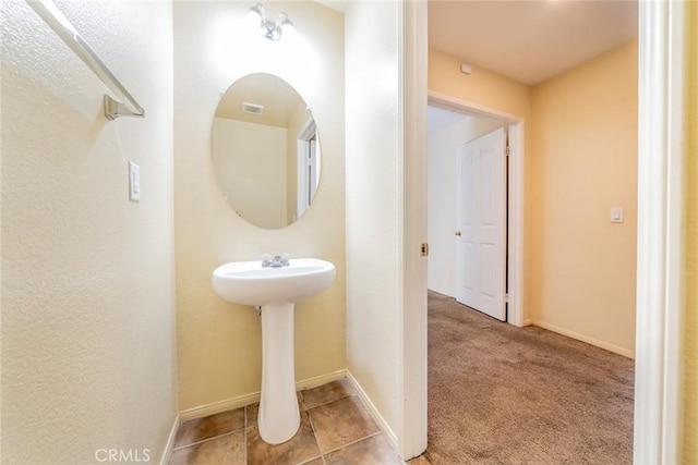 14051 Mare Ln, Victorville, CA 92394 - bathroom featuring baseboards
