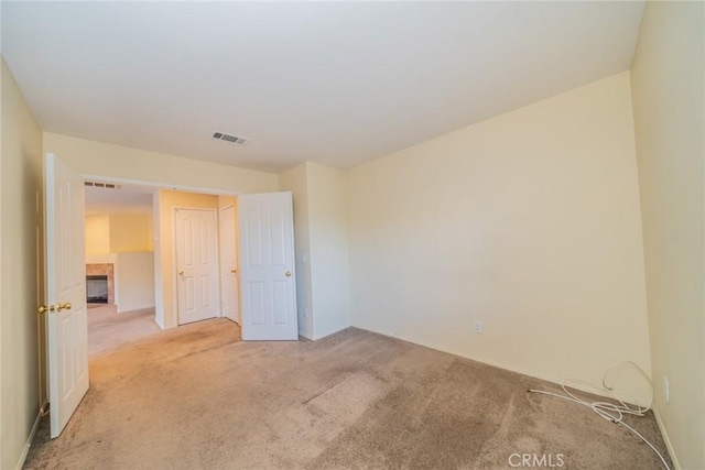 14051 Mare Ln, Victorville, CA 92394 - unfurnished bedroom with light colored carpet