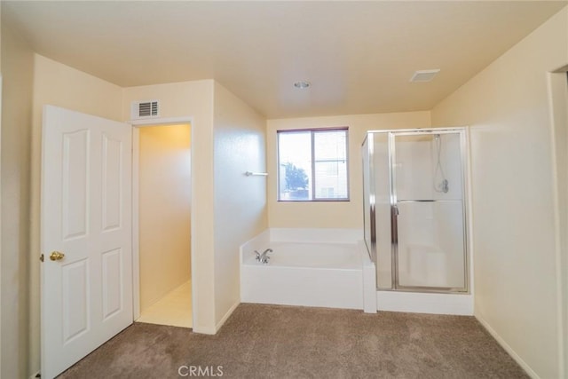14051 Mare Ln, Victorville, CA 92394 - bathroom featuring a shower stall, a garden tub, and carpet flooring