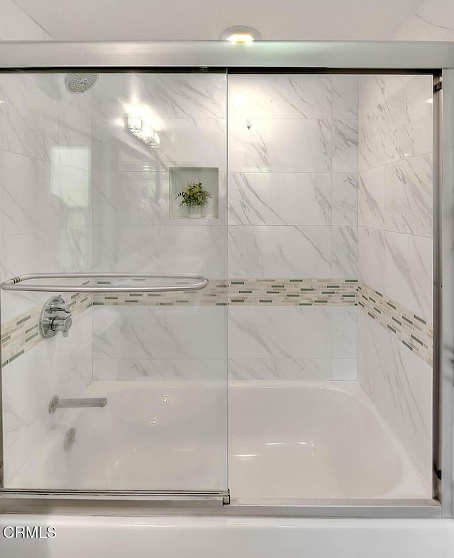 full bath with enclosed tub / shower combo
