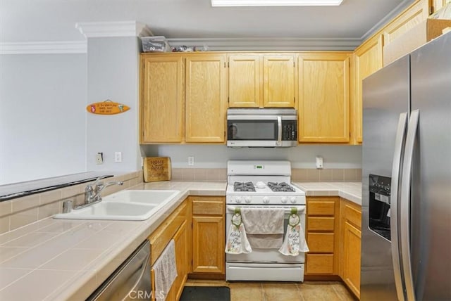1441 Paseo Orion, San Diego, CA 92154 - kitchen with ornamental molding, tile countertops, a sink, light tile patterned floors, and stainless steel appliances